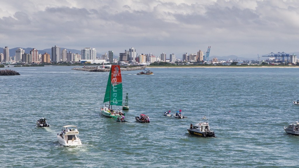 A spectator fleet follows Groupama Sailing Team, skippered by Franck Cammas from France, sailing under jury rig, as they approach the finish line in Itajai, during leg 5 of the Volvo Ocean Race 2011-12 © Ian Roman/Volvo Ocean Race http://www.volvooceanrace.com